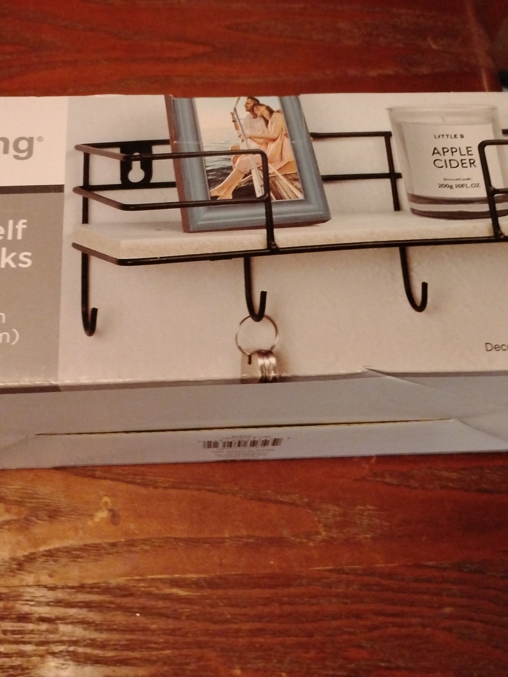 Black Metal Wall Shelf with Hooks